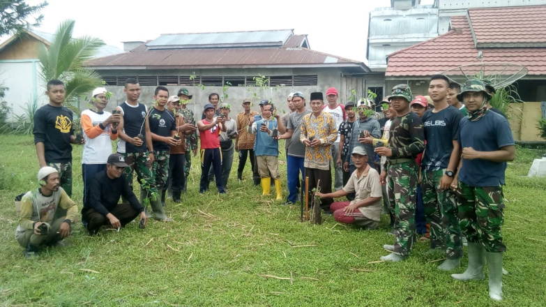 Satgas TMMD ke-106 Tanam Pohon trembisi