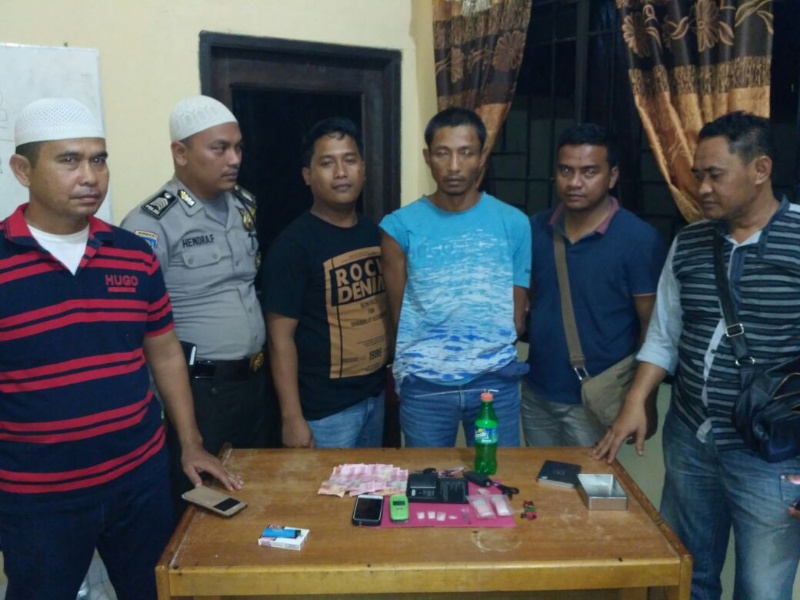 Bandar Narkoba Krinka Sembunyi di Kamar Mandi