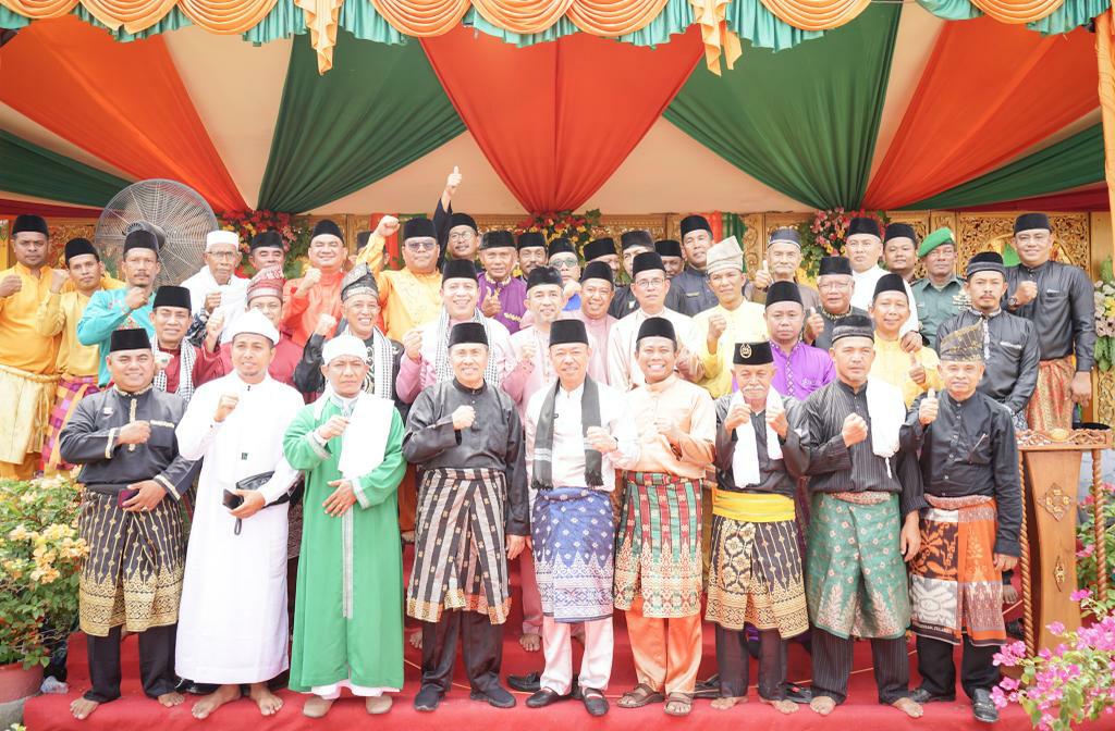 Gubri Syamsuar Bersama Bupati Rohil Afrizal Sintong Hadiri Acara Totau Kenegerian Kubu