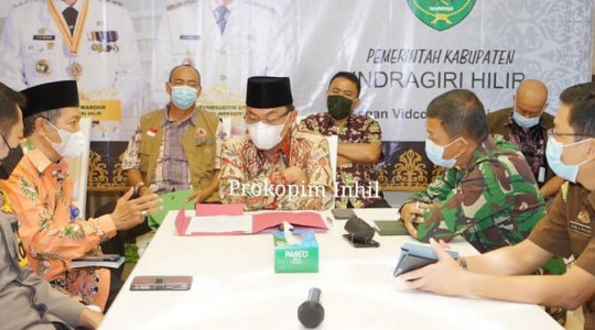 Bupati Inhil Ikuti Rakoor Penanganan Covid-19 dan Mitigasi Bencana
