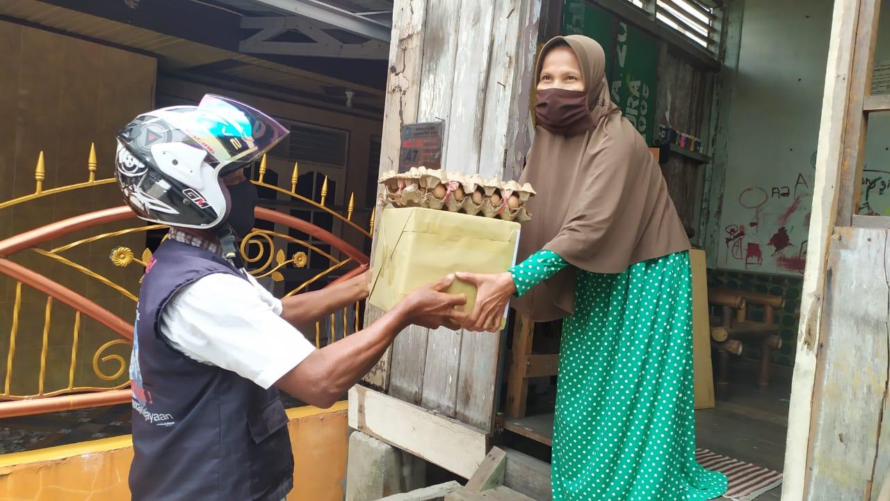 Tali Asih Polres Siak Bantu Masyarakat Yang Terdampak Covid-19