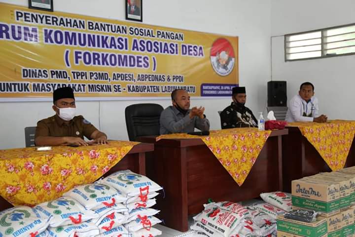 FORKOMDES Labuhanbatu Berikan Bantuan Pangan kepada Masyarakat Kurang Mampu