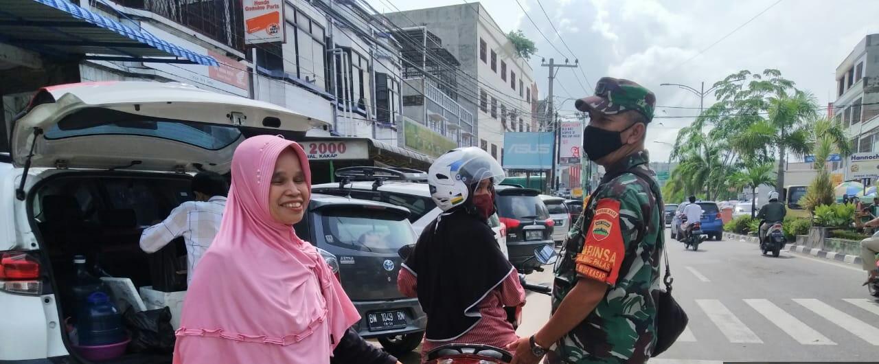 Peltu Wawan Laksanakan Giat Sosialisasi Pencegahan Covid-19 di Jalan Ombak