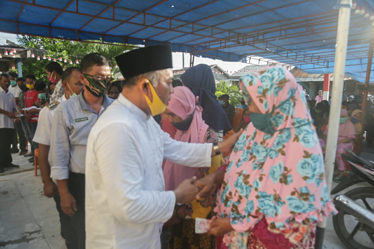 Bupati Hadiri Langsung Penyaluran BLT-DD Tahap Lima Desa Sei Merdeka
