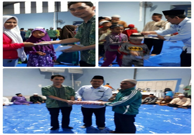 Wilmar Unit Dumai - Pelintung Buka Puasa Bersama Anak Yatim Piatu serta Serahkan 85 Jaring Nelayan