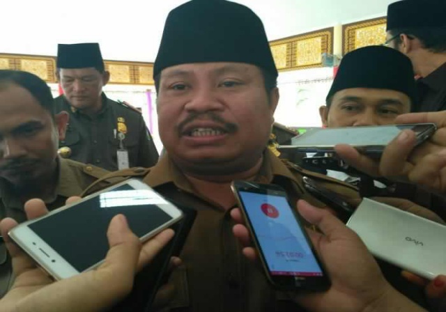 Bupati Bengkalis Amril Mukminin Laporkan Kasus TTD Palsu ke Polisi
