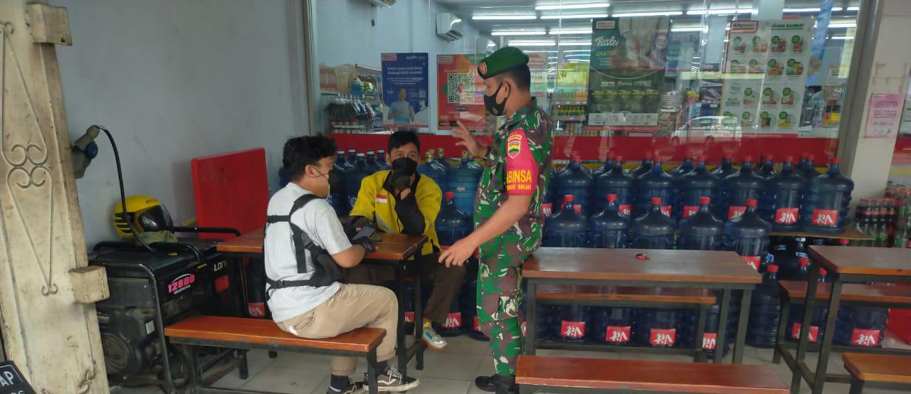 Semangat Giat Sosialisasi Pencegahan Covid-19, Sertu Arjuna Endar Laksanakan di Jalan Sultan Syarif 