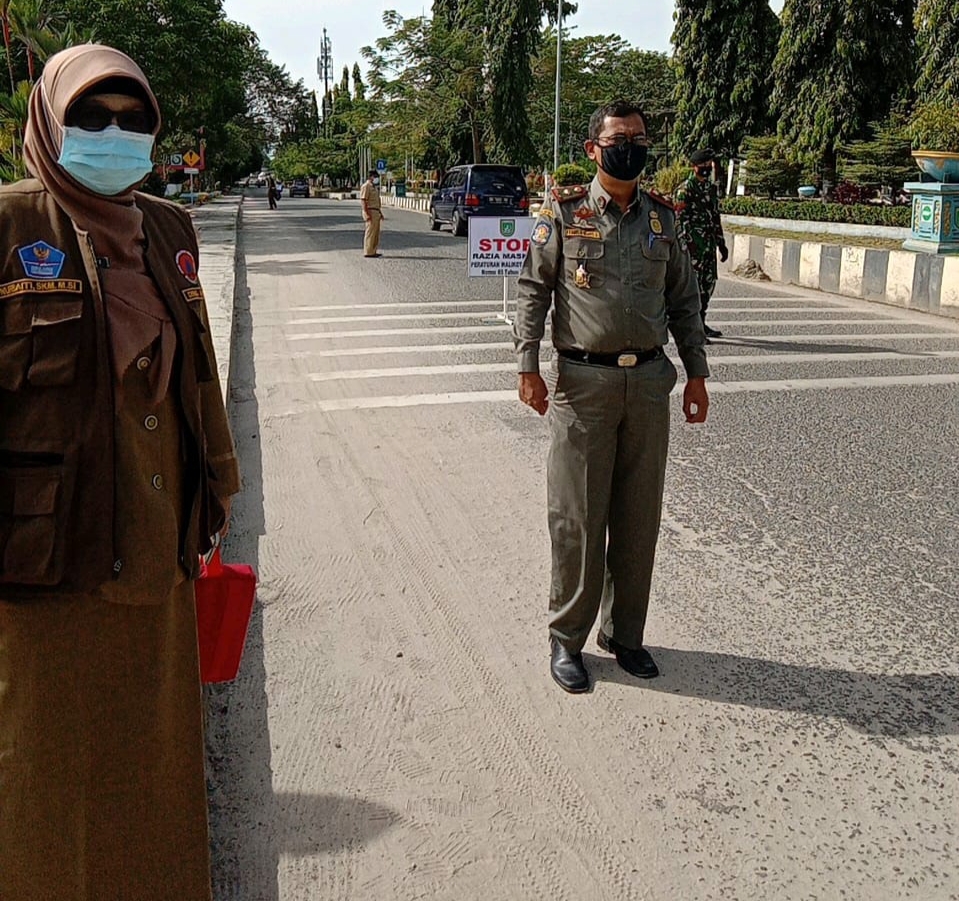 Satpol PP Dumai Bersama Tim Tugas Covid-19 Menggelar Razia Masker