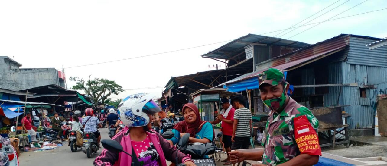 Serma Azman Laksanakan Giat Sosialisasi Pencegahan Covid-19 di Jalan Sidodadi
