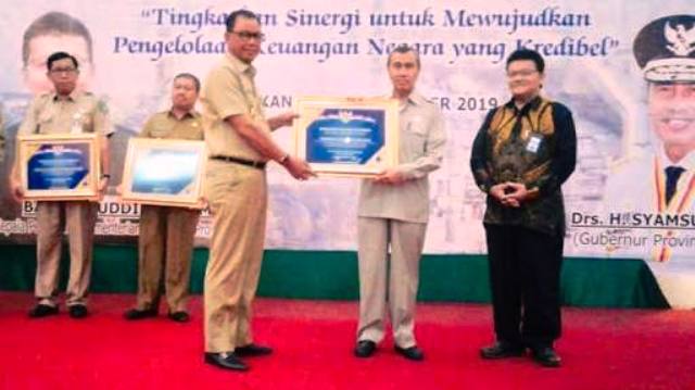 Rohil Terima Anugrah Pertama WTP 2018 dari BPK