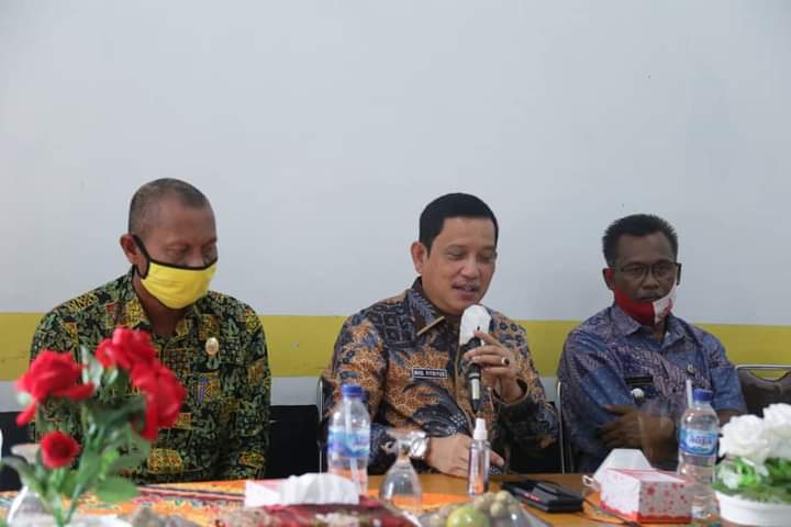 Cegah Penyebaran Covid-19, Pemkab Labuhanbatu Bagikan Seribu Masker di Bilah Hilir